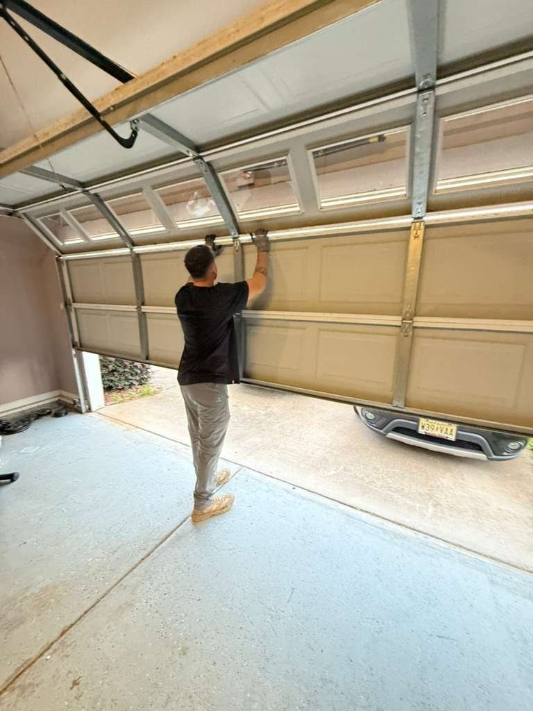 Garage Door Cable Repair work on a garage door