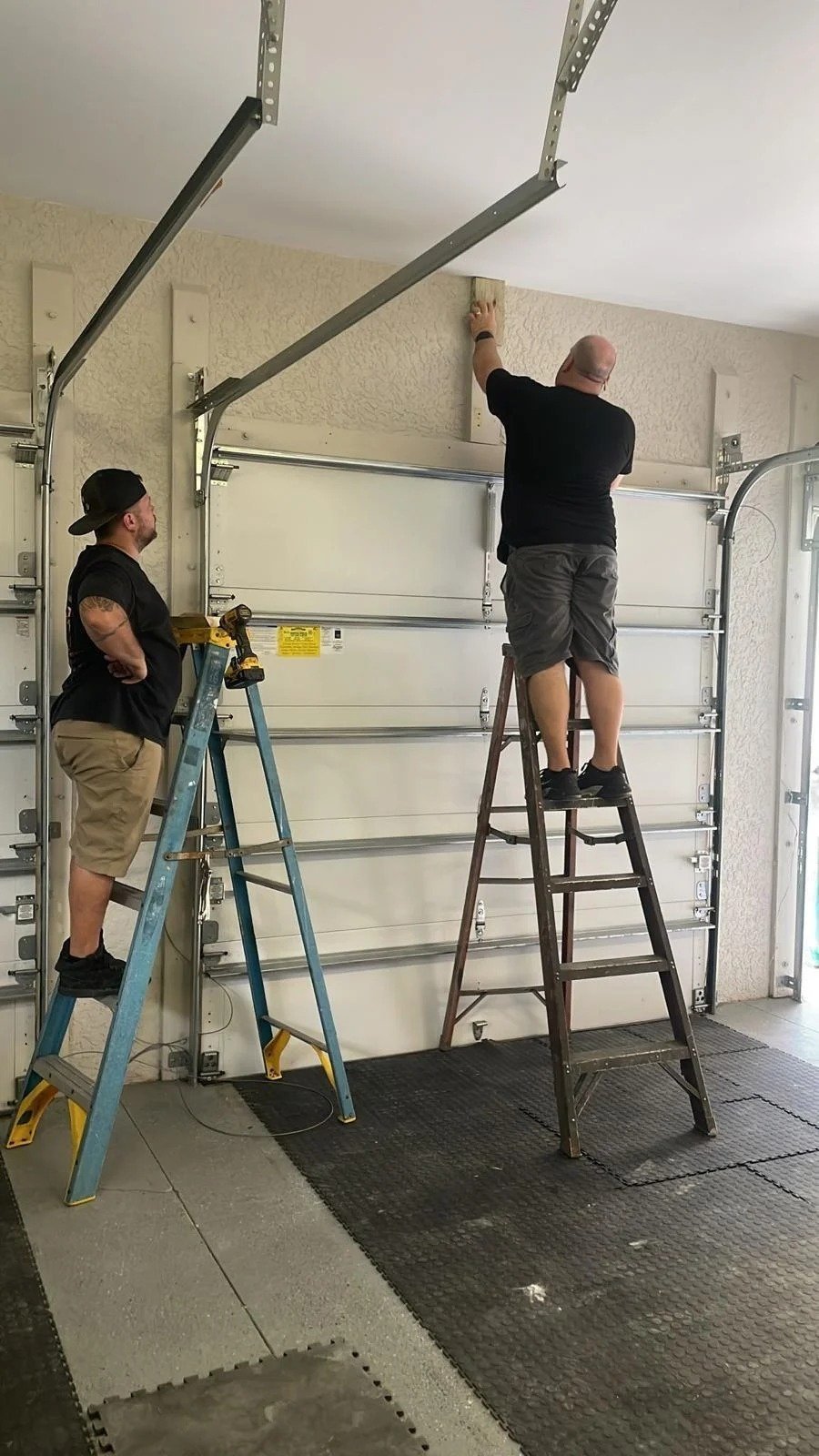 Garage Door Opener Installation work on a garage door