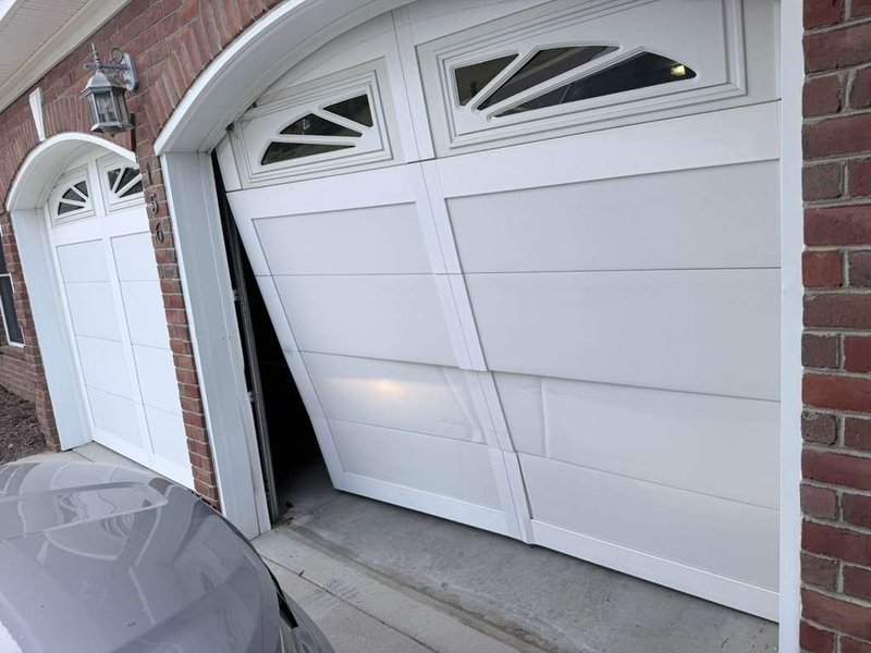 Off-Track Garage Door Repair by Cardinal of Asheville